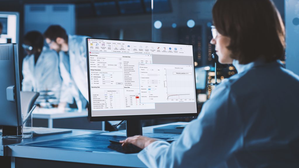 Female IT Scientist Uses Green Mock-up Screen Computer